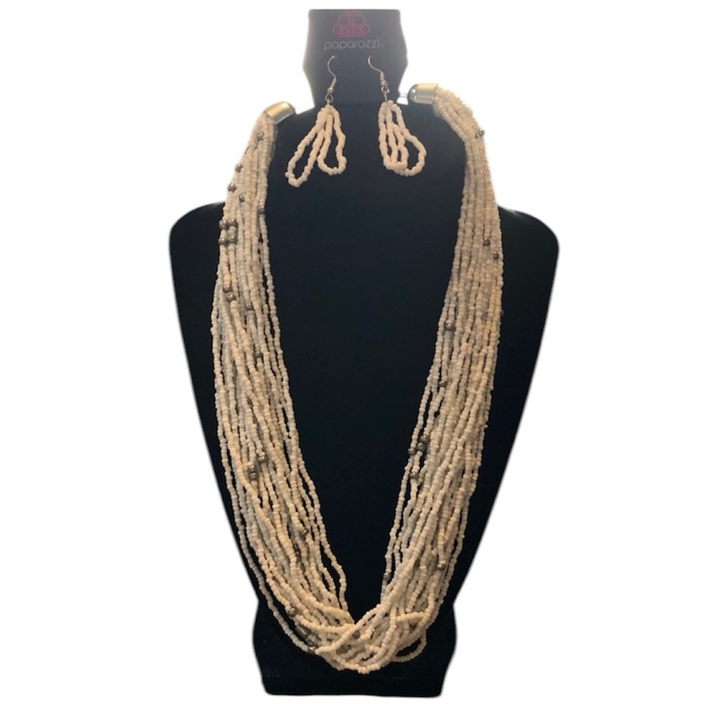 White seeded beads silver tone necklace and matching pierced earrings.